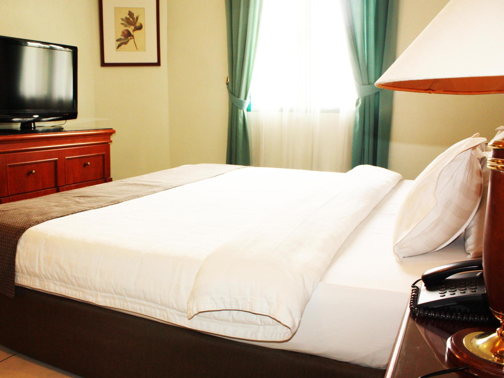 Travellers Suites Serviced Apartments Medan Esterno foto